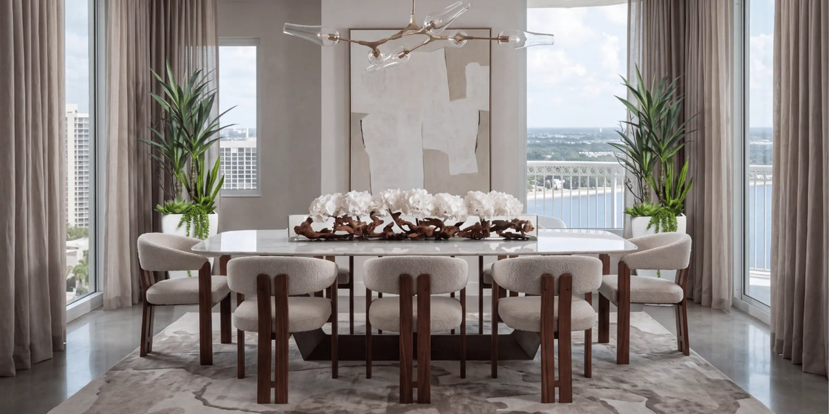 Sculptural botanical composition beside a window in an elegant living room